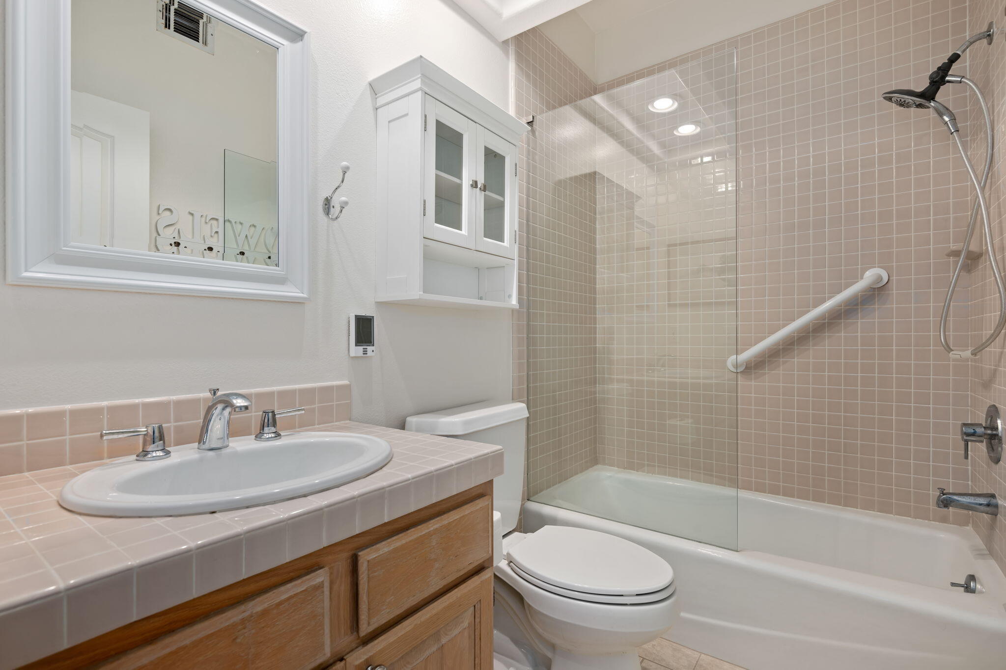 1260 Cravens Lane, Unit 2 Carpinteria, CA 93013 - Photo 15 of 23 a bathroom with a sink toilet and shower
