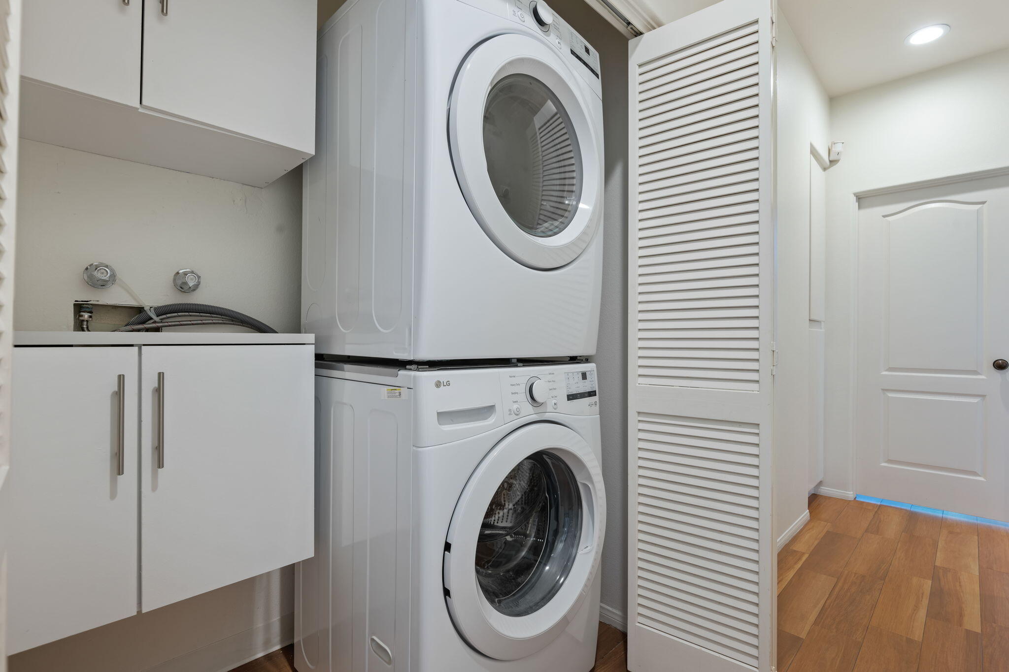 1260 Cravens Lane, Unit 2 Carpinteria, CA 93013 - Photo 16 of 23 a utility room with dryer and washer
