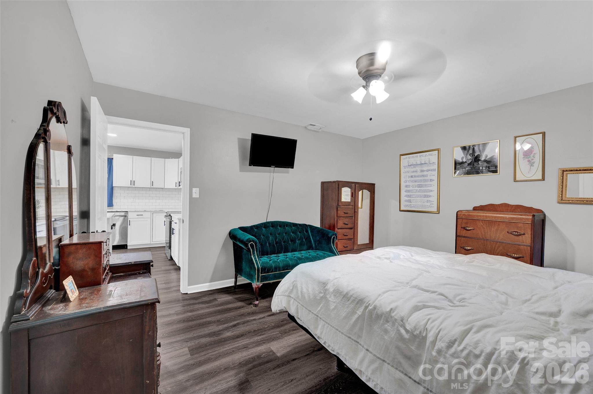 3033 West Highway 10 Conover, NC 28613 - Photo 19 of 26 a bedroom with a large bed and a tv
