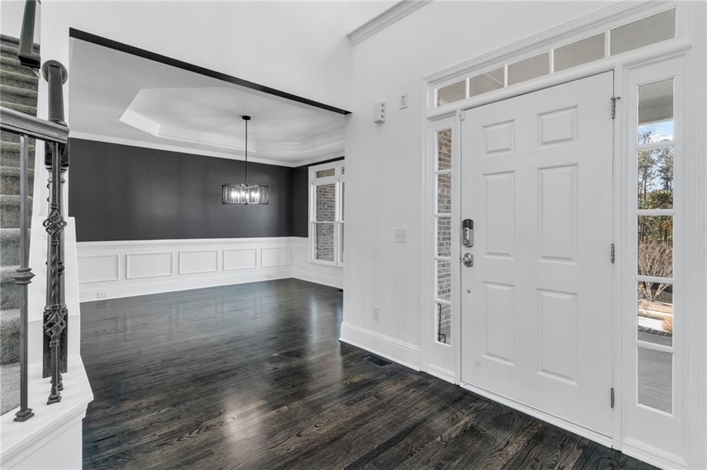 271 Ivy Hall Lane Dallas, GA 30132 - Photo 35 of 120 a view of an empty room with wooden floor and a window