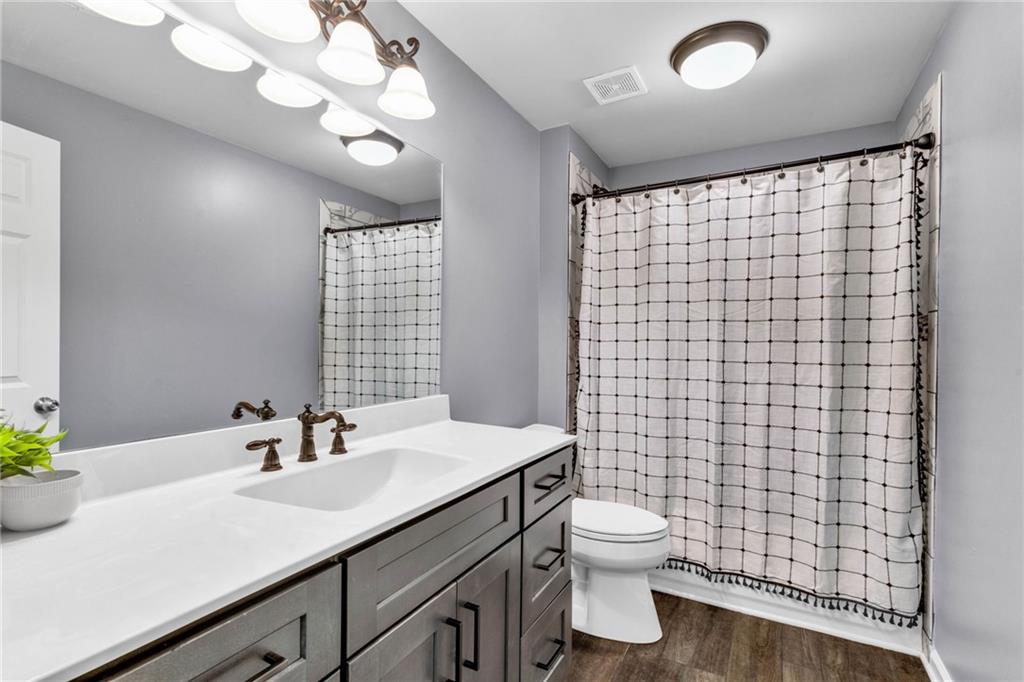 271 Ivy Hall Lane Dallas, GA 30132 - Photo 80 of 120 a bathroom with a sink a toilet and shower