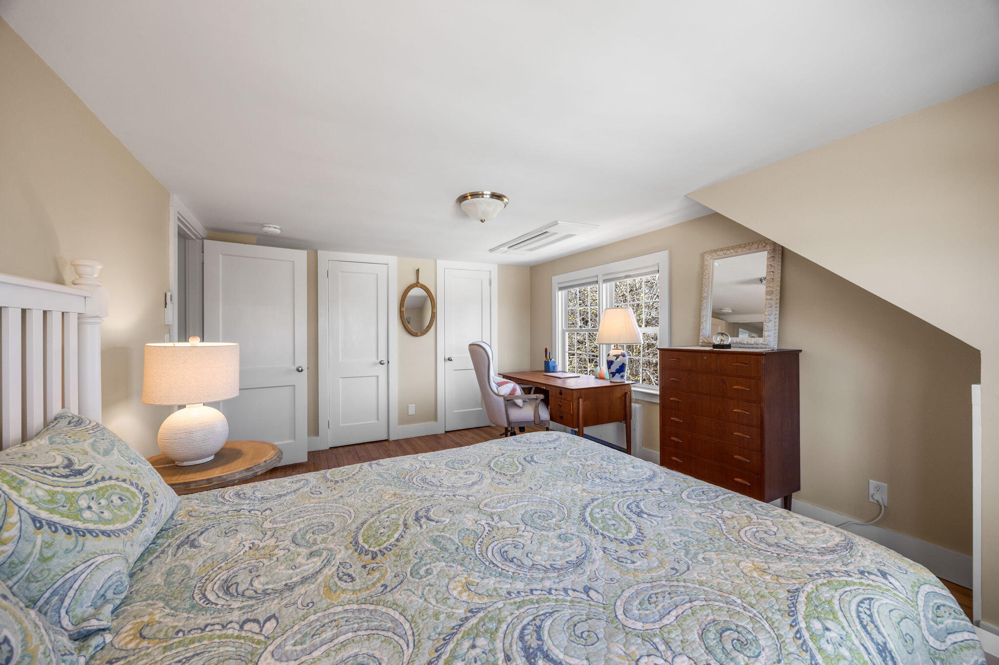 58 Stepping Stones Road Chatham, MA 02633 - Photo 21 of 52 a bedroom with a bed and wooden floor