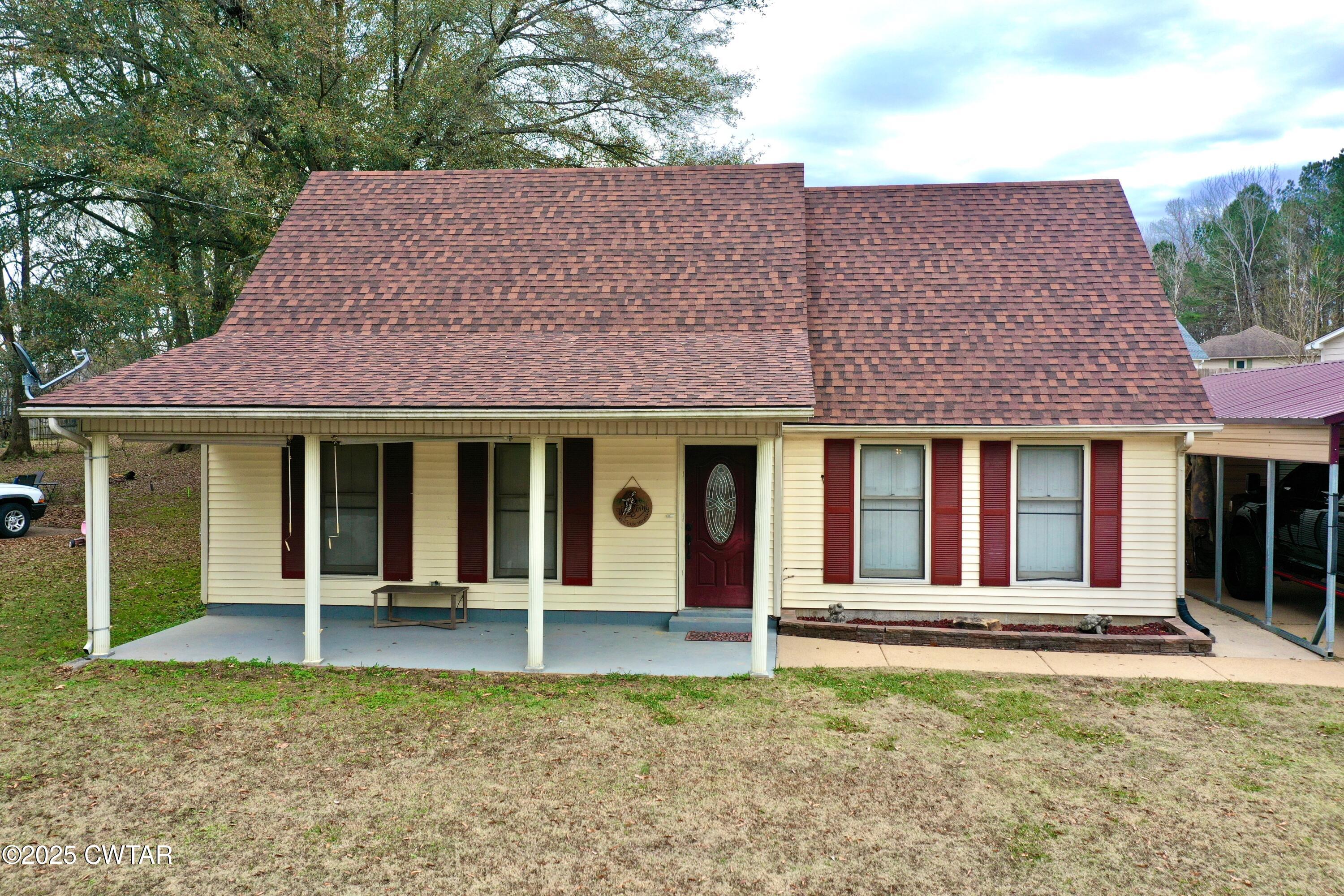 625 Hanna Drive Ripley, TN 38063 - Photo 1 of 26 front view of a house with a yard