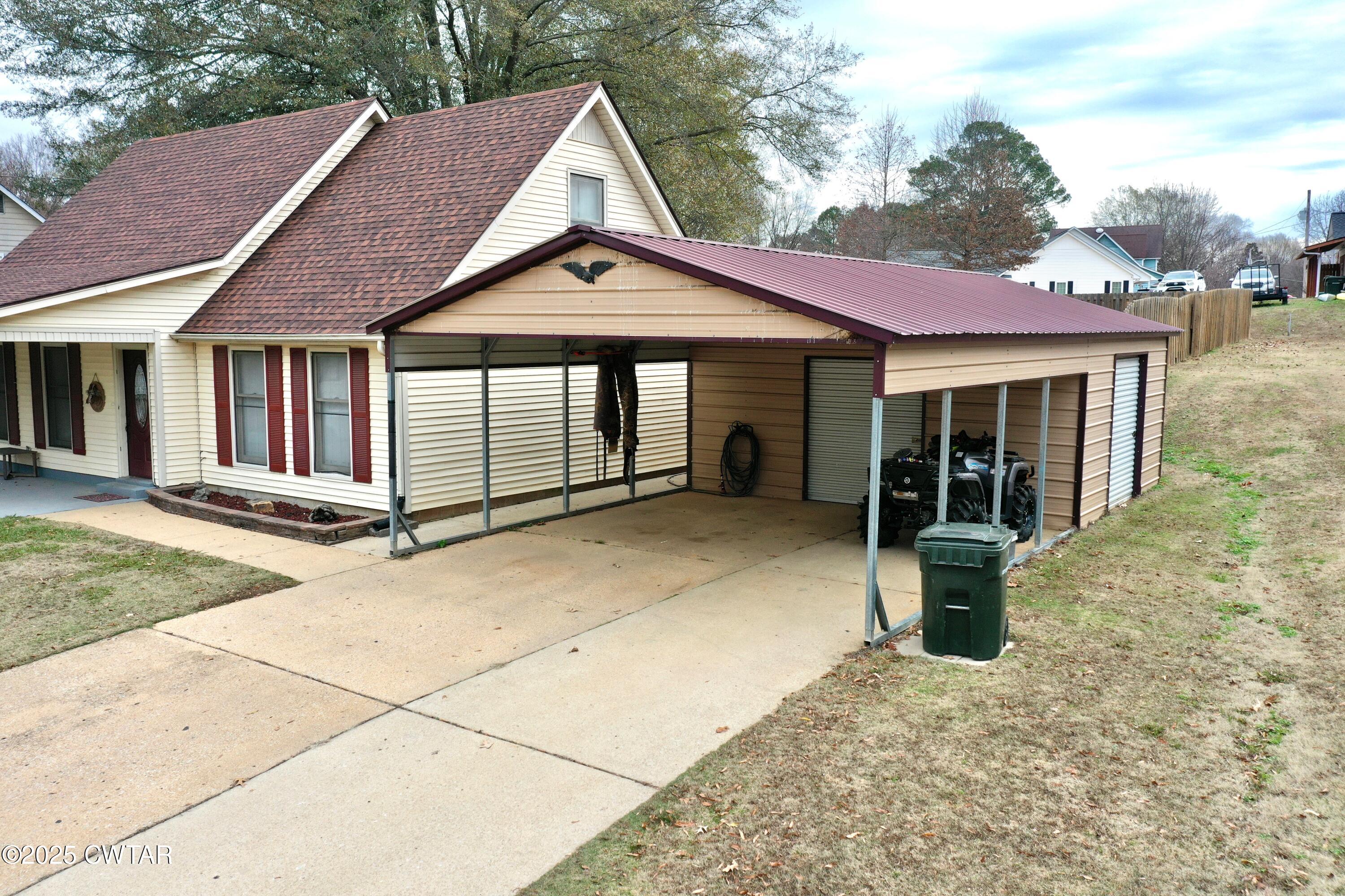 625 Hanna Drive Ripley, TN 38063 - Photo 17 of 26 a front view of a house with a yard