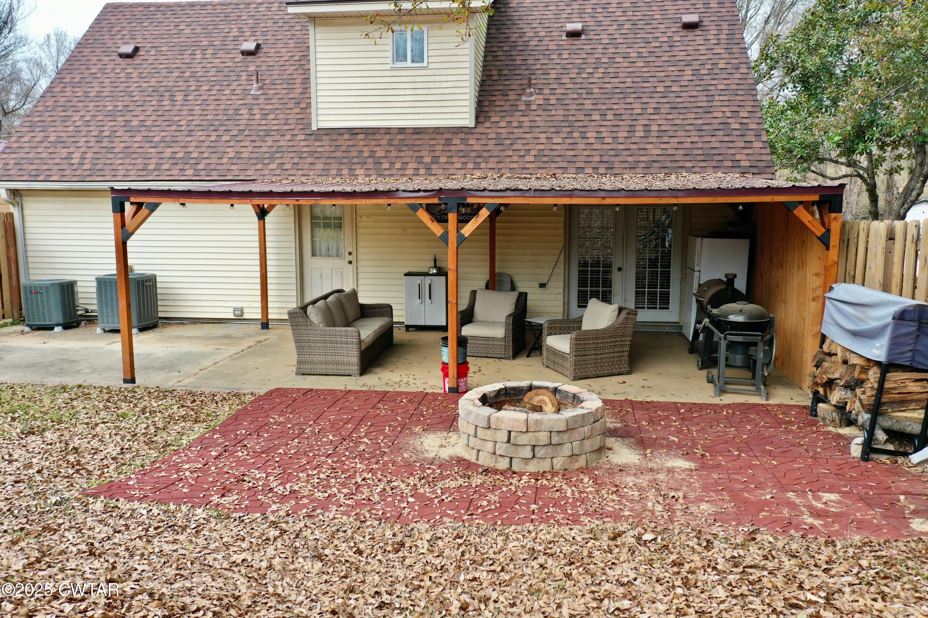 625 Hanna Drive Ripley, TN 38063 - Photo 20 of 26 a outdoor space with lots of swings and slides