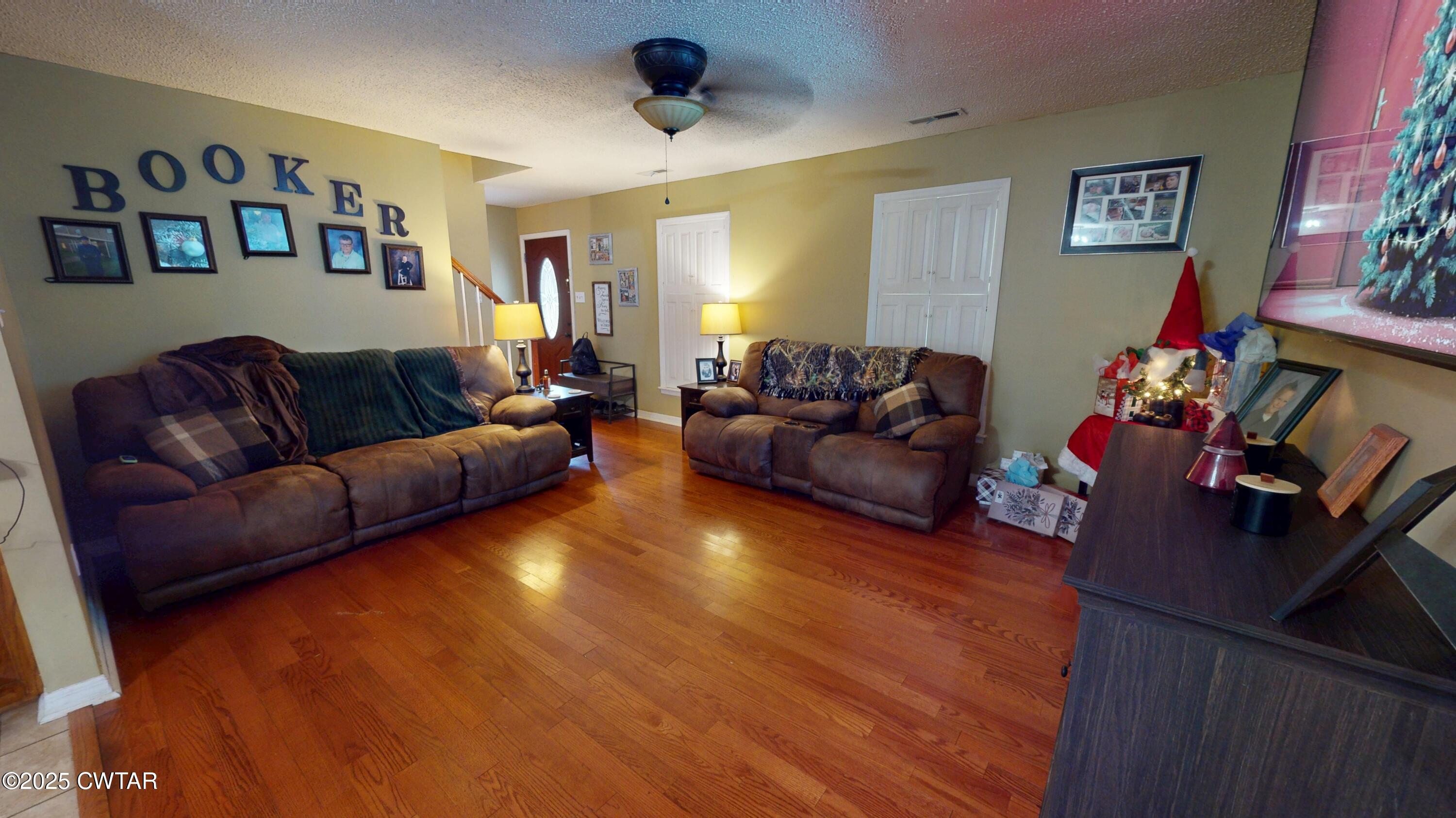 625 Hanna Drive Ripley, TN 38063 - Photo 2 of 26 a living room with furniture and a flat screen tv