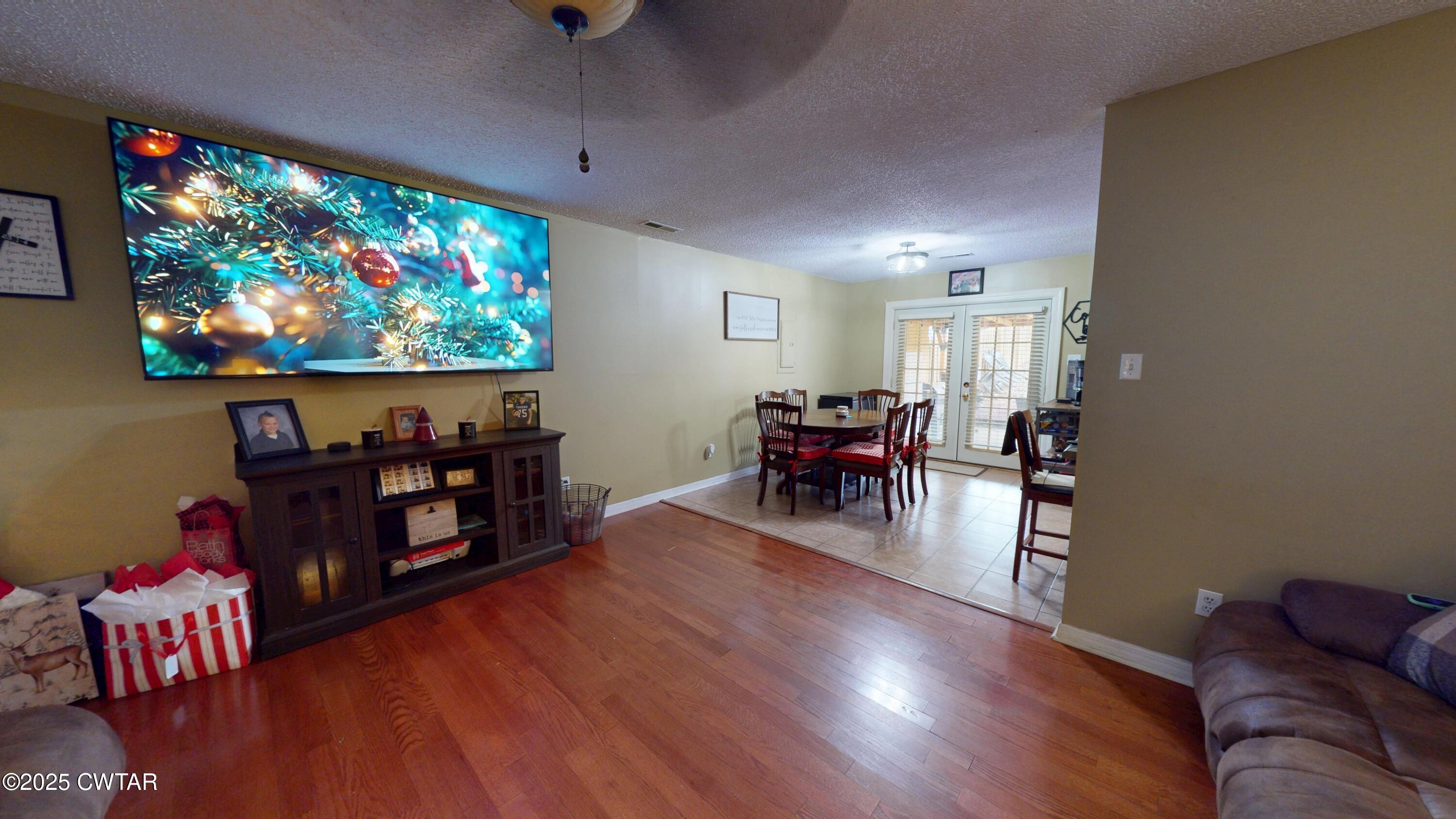 625 Hanna Drive Ripley, TN 38063 - Photo 4 of 26 a living room with furniture and a flat screen tv