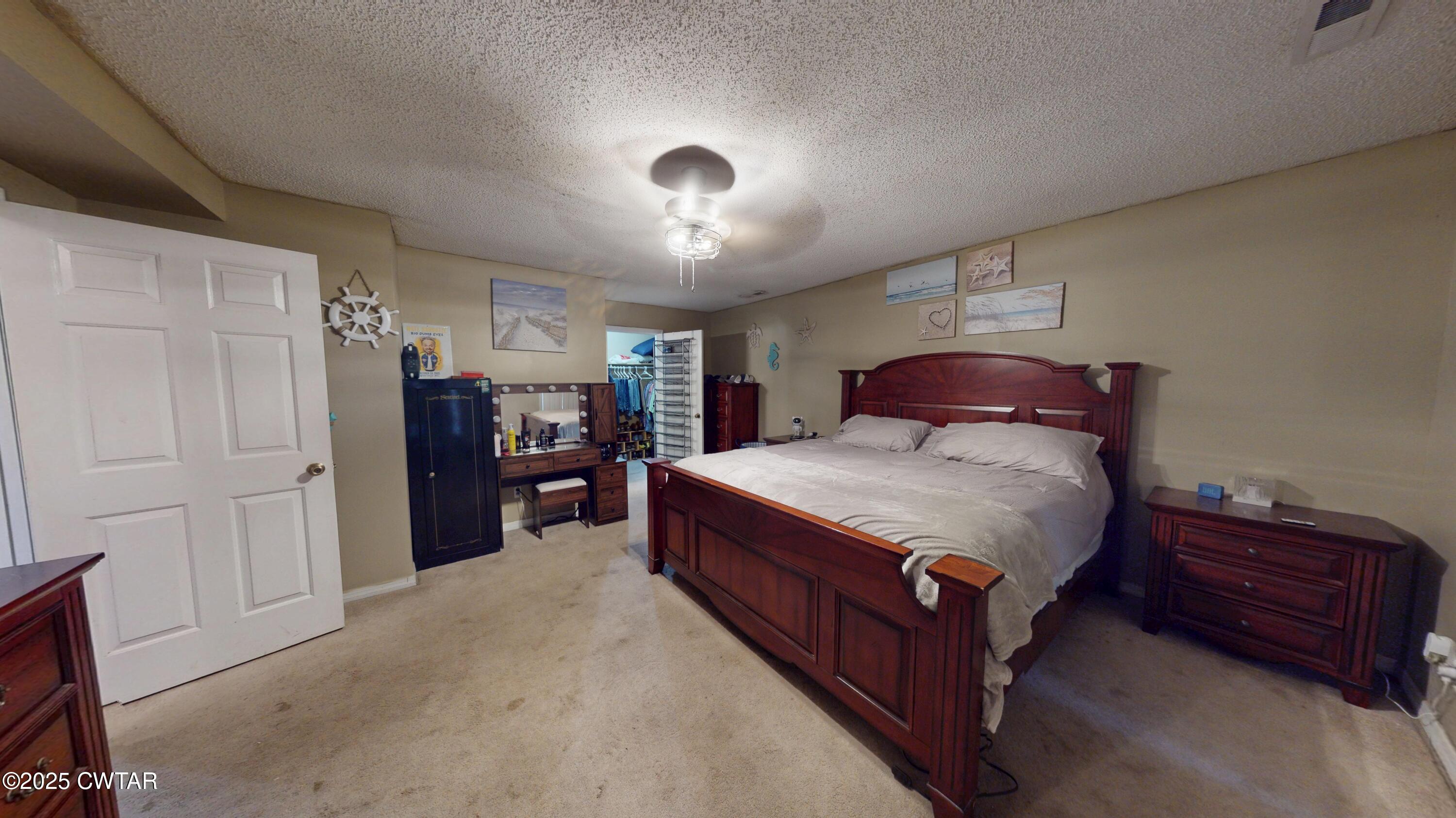 625 Hanna Drive Ripley, TN 38063 - Photo 9 of 26 a spacious bedroom with a bed and a dresser