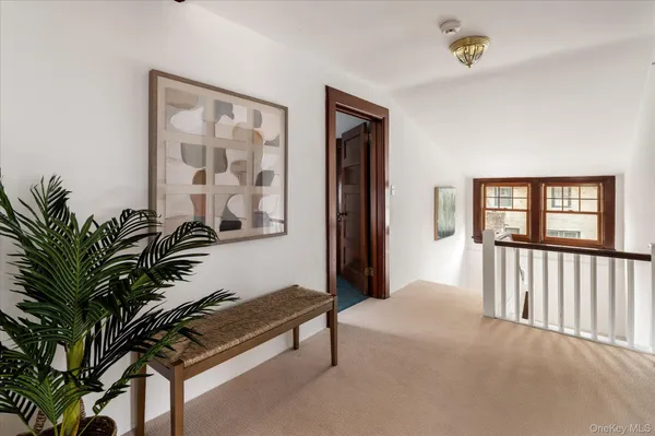 a livingroom with furniture and window