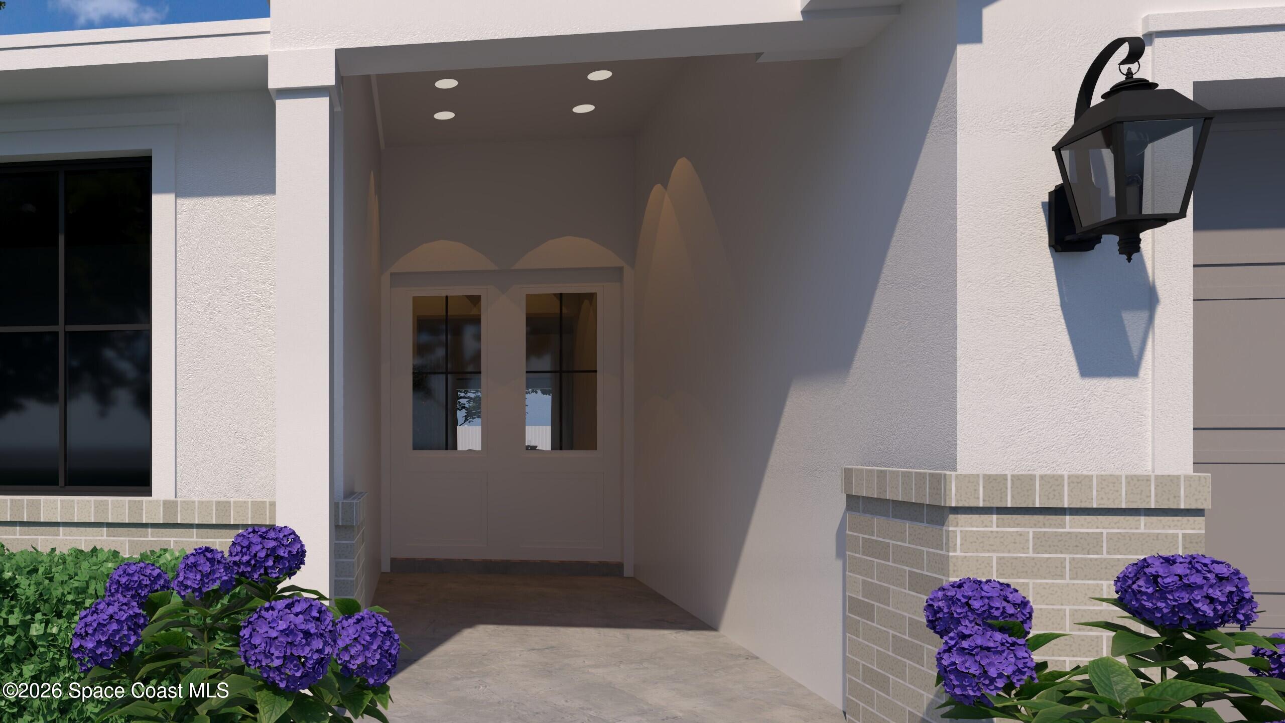 1850 Viburnum Road Northwest Palm Bay, FL 32907 - Photo 15 of 15 a view of entryway and flowers