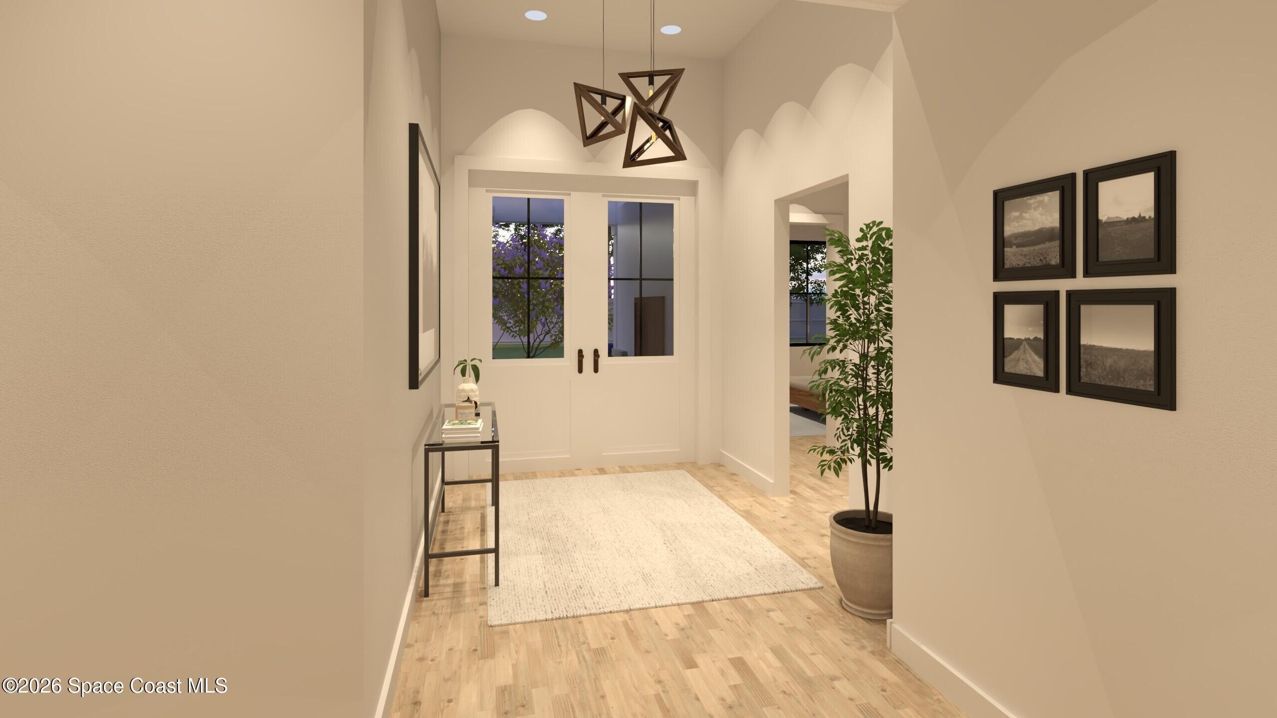 1850 Viburnum Road Northwest Palm Bay, FL 32907 - Photo 9 of 15 a view of an entryway with wooden floor