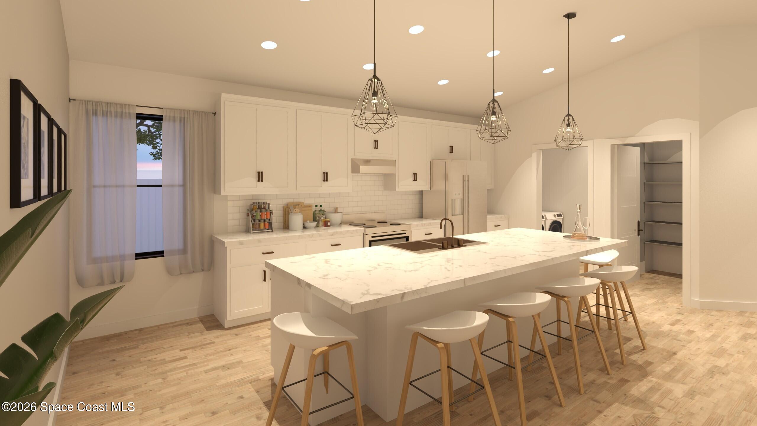 1850 Viburnum Road Northwest Palm Bay, FL 32907 - Photo 10 of 15 a kitchen with kitchen island a sink stove and refrigerator