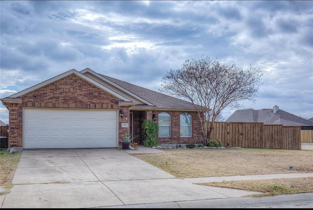 a view of a house with a garage