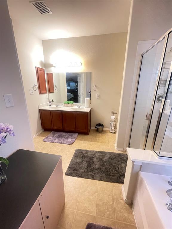 301 Long Prairie Drive Forney, TX 75126 - Photo 13 of 16 a living room with furniture and a couch