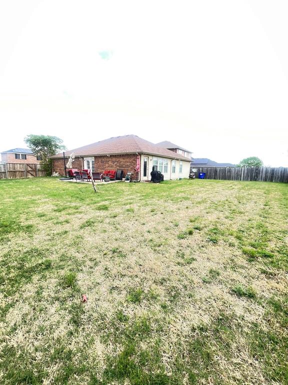 301 Long Prairie Drive Forney, TX 75126 - Photo 16 of 16 a view of a field with an ocean beach