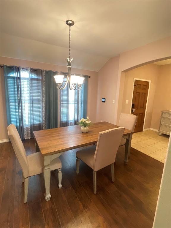 301 Long Prairie Drive Forney, TX 75126 - Photo 5 of 16 a view of a dining room with furniture window and wooden floor