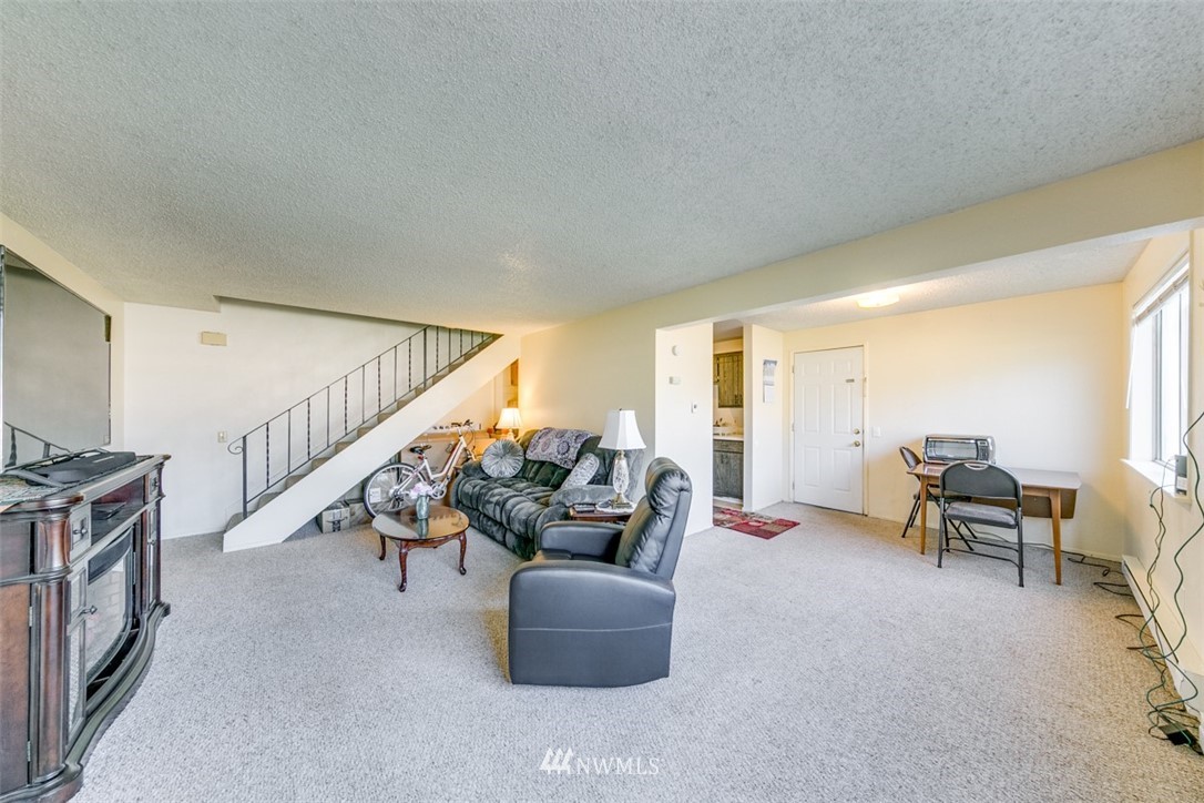 511 Terra Eden Street Forks, WA 98331 - Photo 11 of 21 a living room with furniture and stairs
