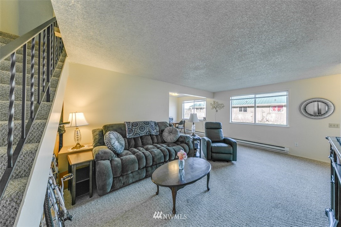 511 Terra Eden Street Forks, WA 98331 - Photo 13 of 21 a living room with furniture and a window