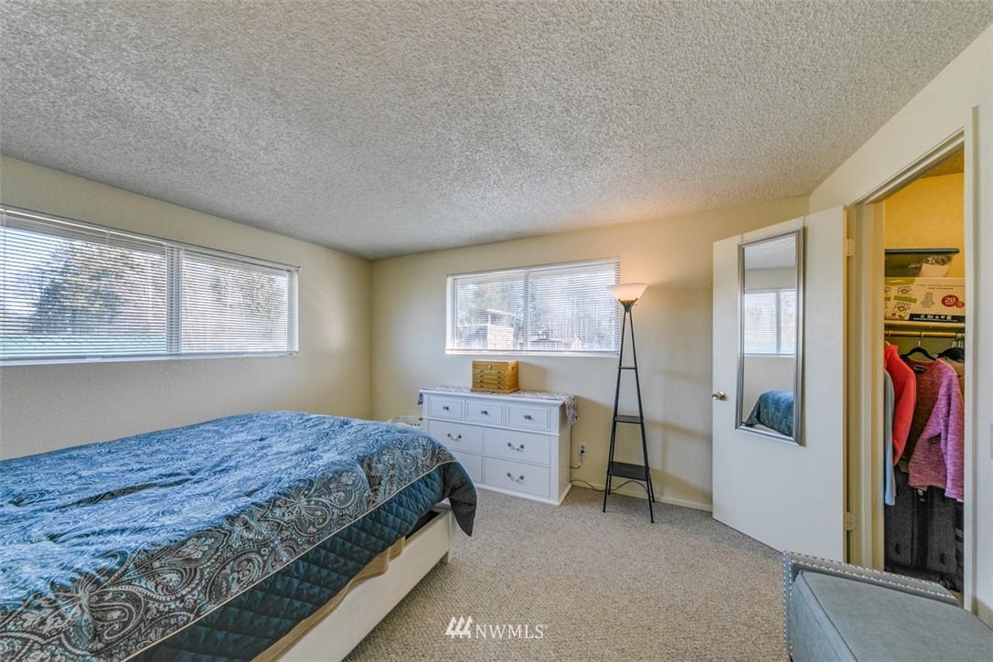 511 Terra Eden Street Forks, WA 98331 - Photo 16 of 21 a bedroom with a bed and a window