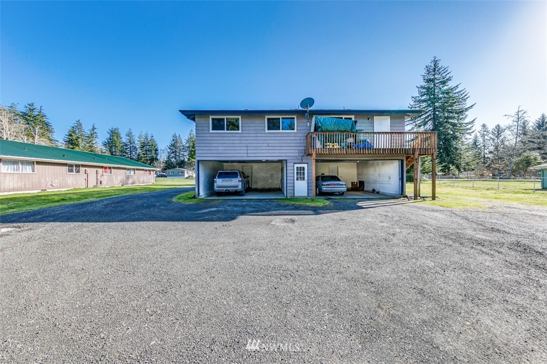 511 Terra Eden Street Forks, WA 98331 - Photo 5 of 21 a front view of a house with a yard and garage