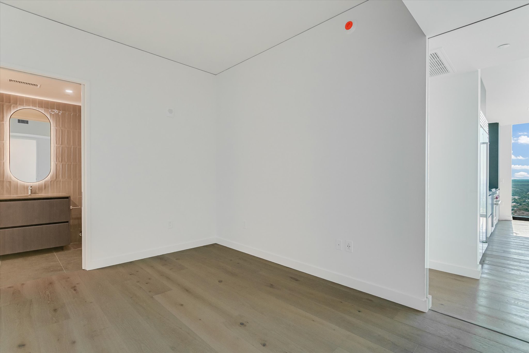 610 Davis Street, Unit 3801 Austin, TX 78701 - Photo 12 of 40 a view of empty room with wooden floor