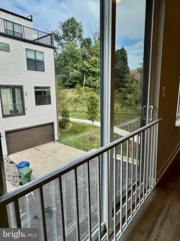 a view of a balcony with an outdoor space