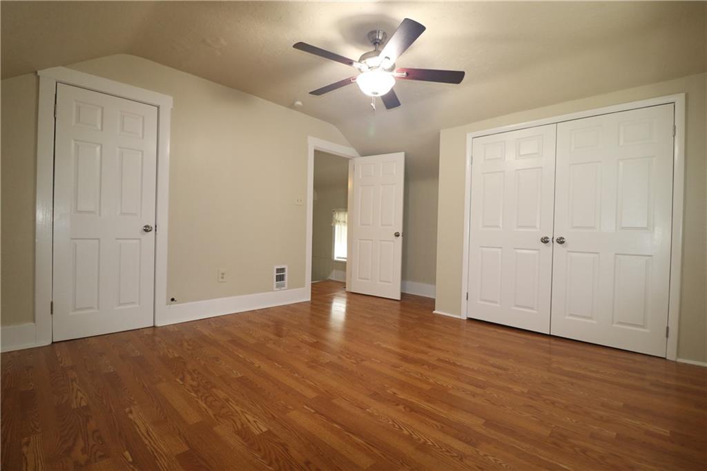 449 Spring Street Richeyville, PA 15358 - Photo 12 of 17 an empty room with fan and a ceiling fan