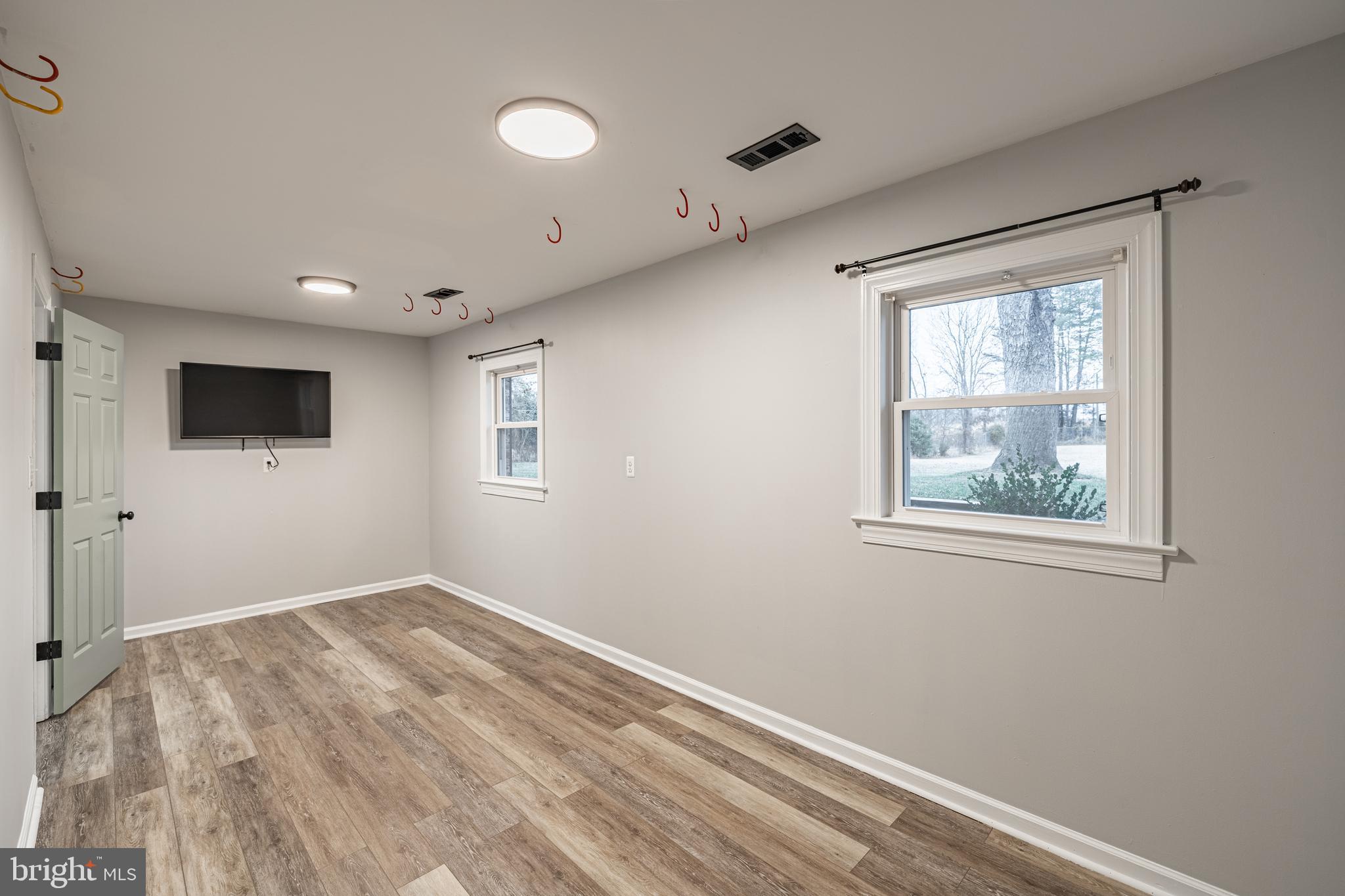 1251 Hartwood Road Fredericksburg, VA 22406 - Photo 13 of 28 a view of an empty room with a window