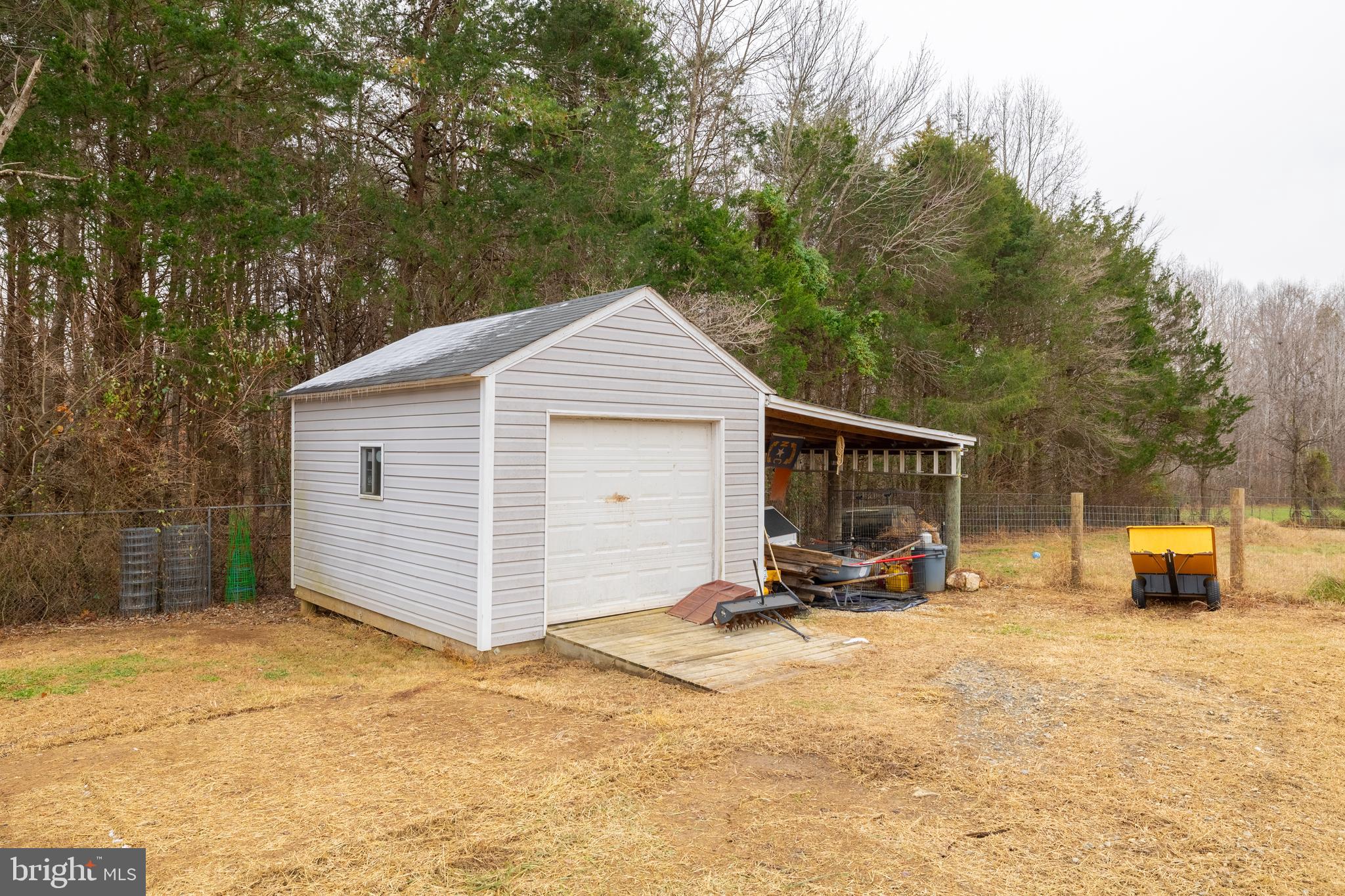 1251 Hartwood Road Fredericksburg, VA 22406 - Photo 20 of 28 a view of a house with a yard and sitting area