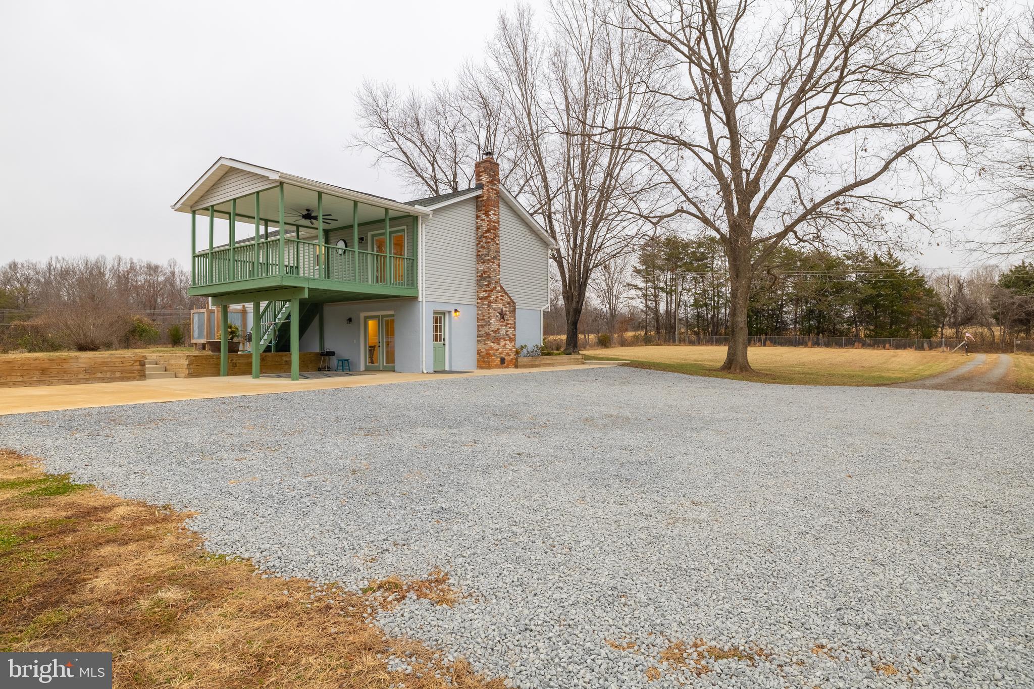 1251 Hartwood Road Fredericksburg, VA 22406 - Photo 21 of 28 a view of large house with a yard