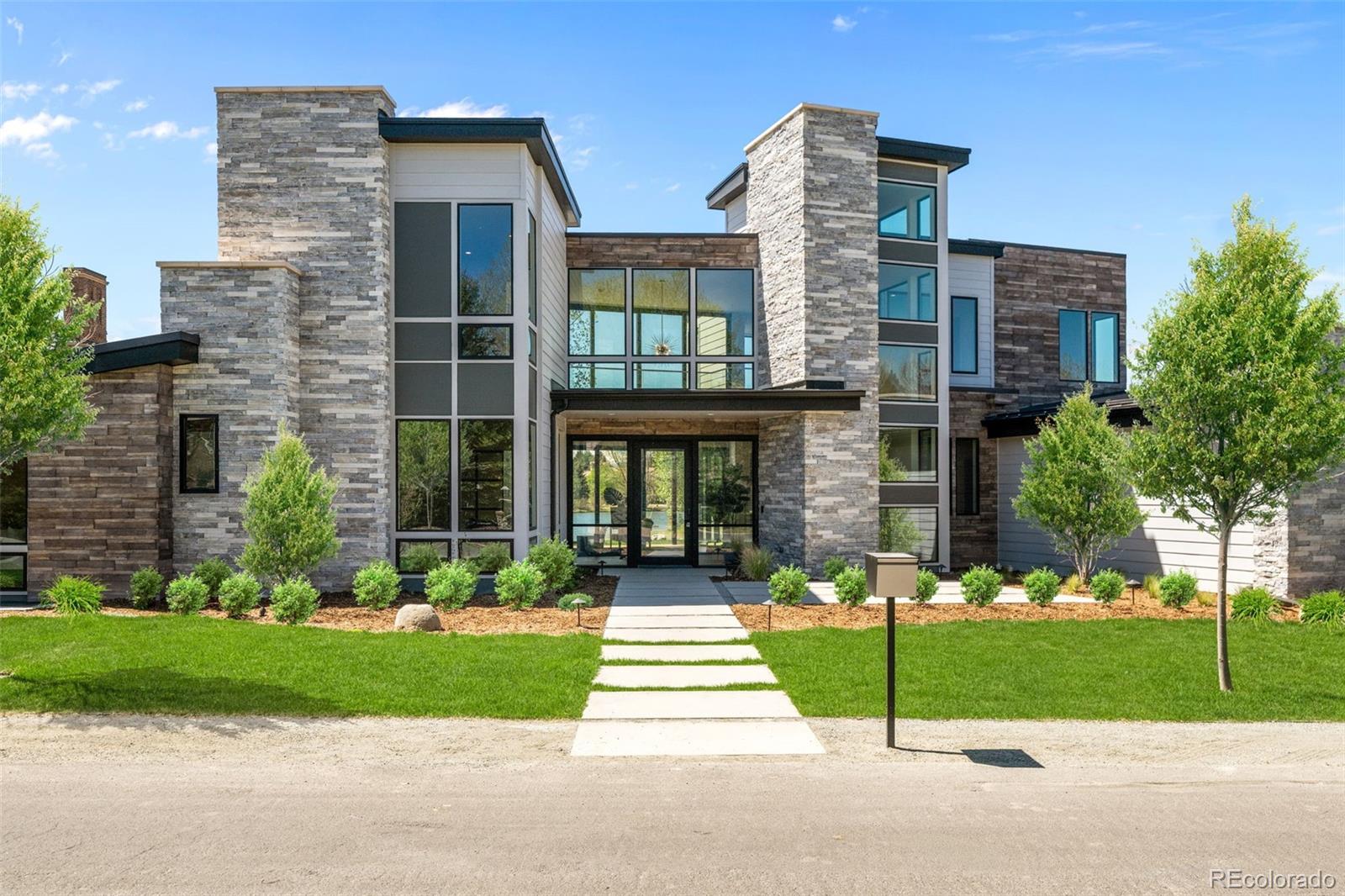 15 Sandy Lake Road Cherry Hills Village, CO 80113 - Photo 1 of 48 a front view of a house