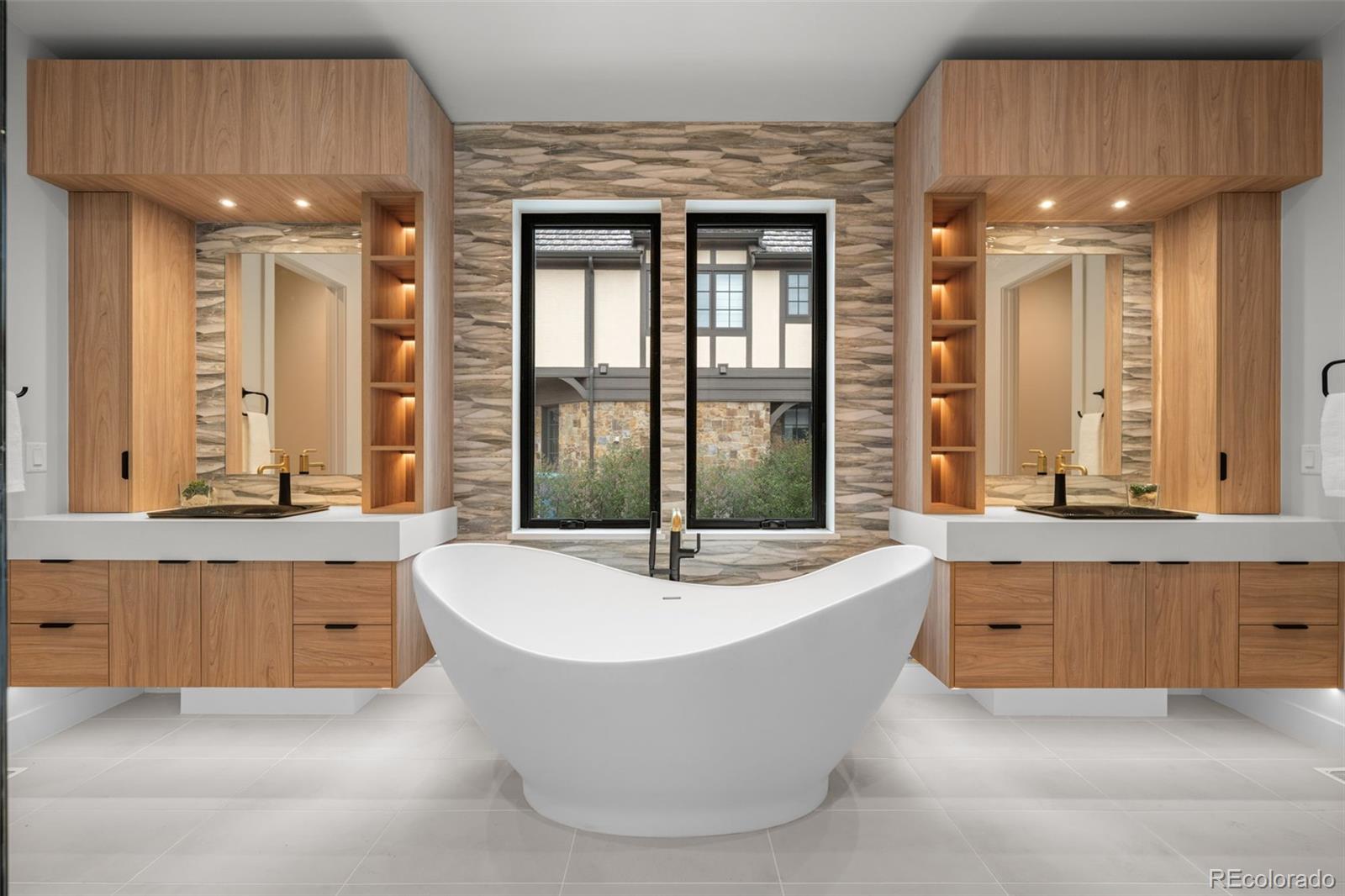 15 Sandy Lake Road Cherry Hills Village, CO 80113 - Photo 21 of 48 a spacious bathroom with a tub sink and mirror