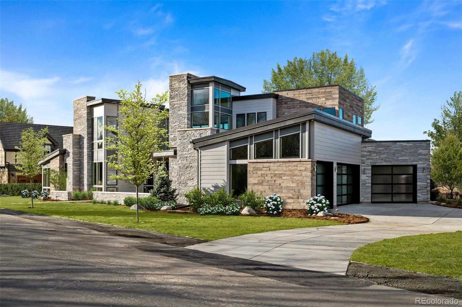 15 Sandy Lake Road Cherry Hills Village, CO 80113 - Photo 48 of 48 a view of a building with a yard