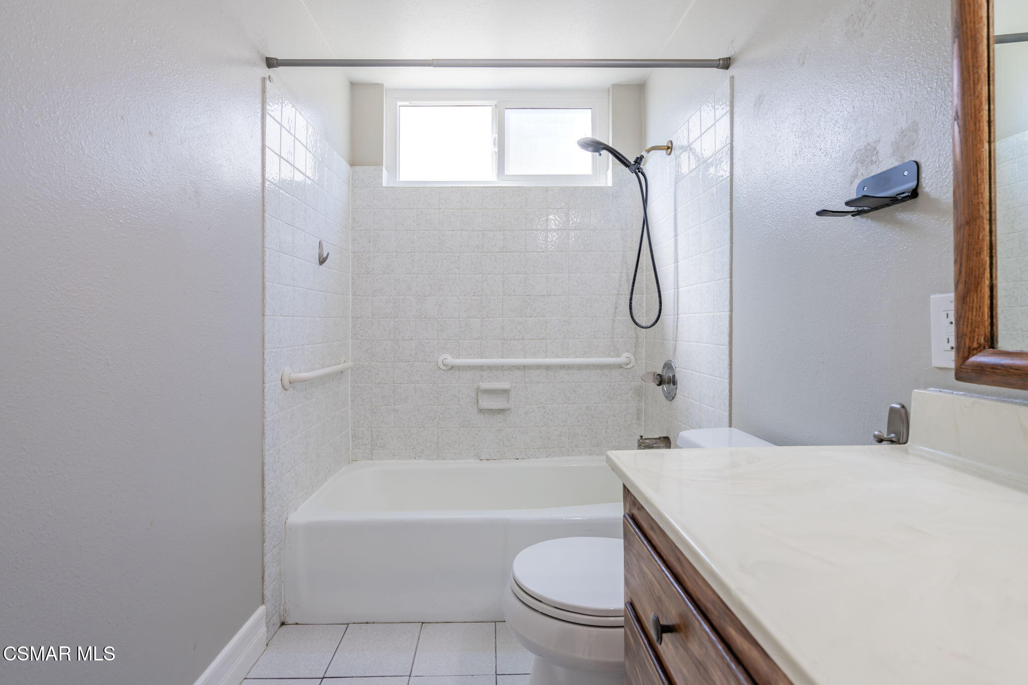 3648 Woodhaven Street Simi Valley, CA 93063 - Photo 16 of 30 a bathroom with a granite countertop bathtub shower sink vanity and toilet