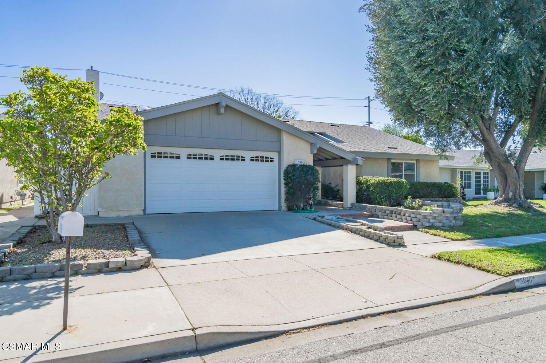 3648 Woodhaven Street Simi Valley, CA 93063 - Photo 2 of 30 a front view of a house with garden
