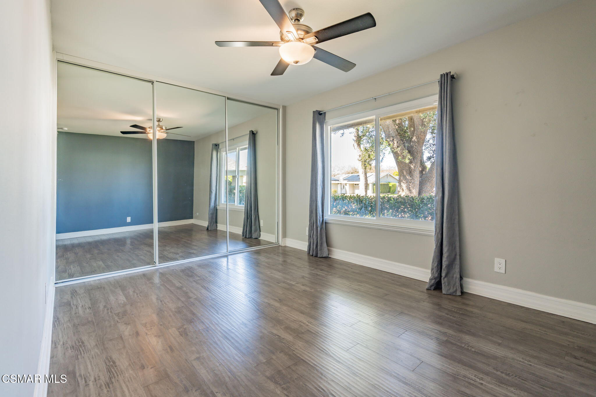 3648 Woodhaven Street Simi Valley, CA 93063 - Photo 23 of 30 wooden floor in an empty room with a window