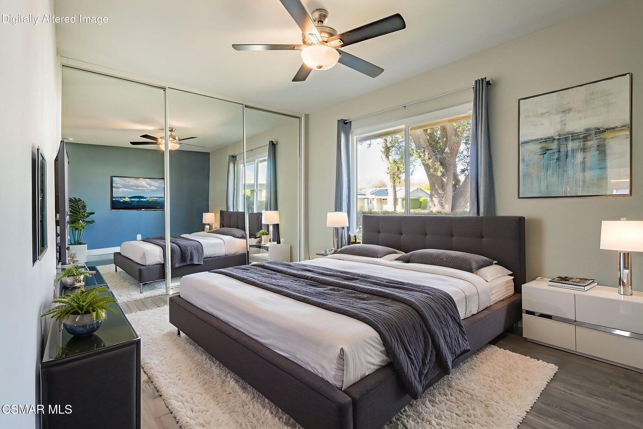 3648 Woodhaven Street Simi Valley, CA 93063 - Photo 24 of 30 a bedroom with a bed and wooden floor