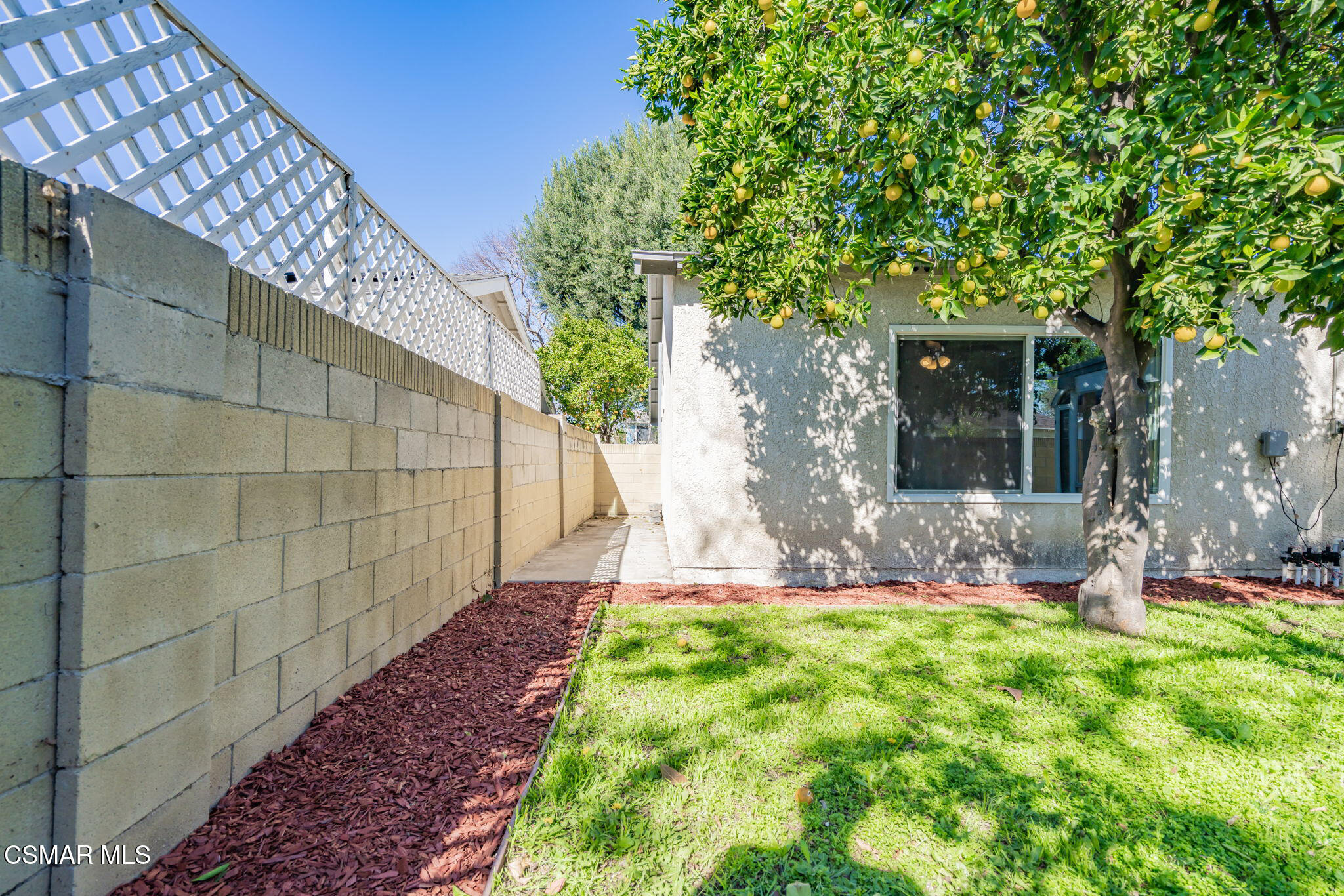 3648 Woodhaven Street Simi Valley, CA 93063 - Photo 29 of 30 a view of an house with backyard porch and sitting area