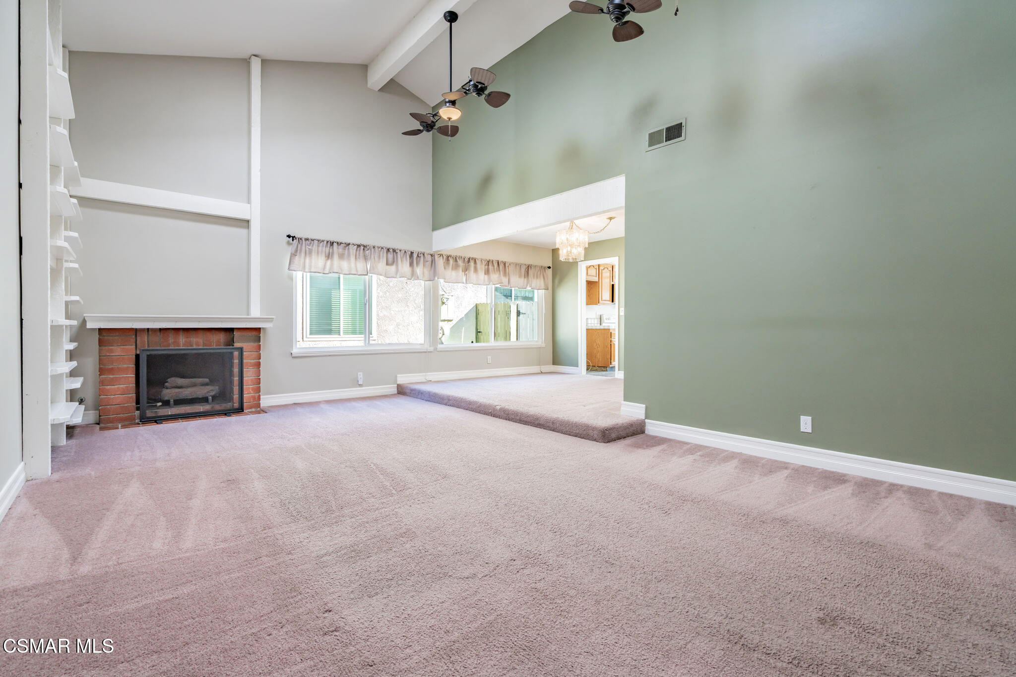 3648 Woodhaven Street Simi Valley, CA 93063 - Photo 5 of 30 an empty room with windows and fireplace
