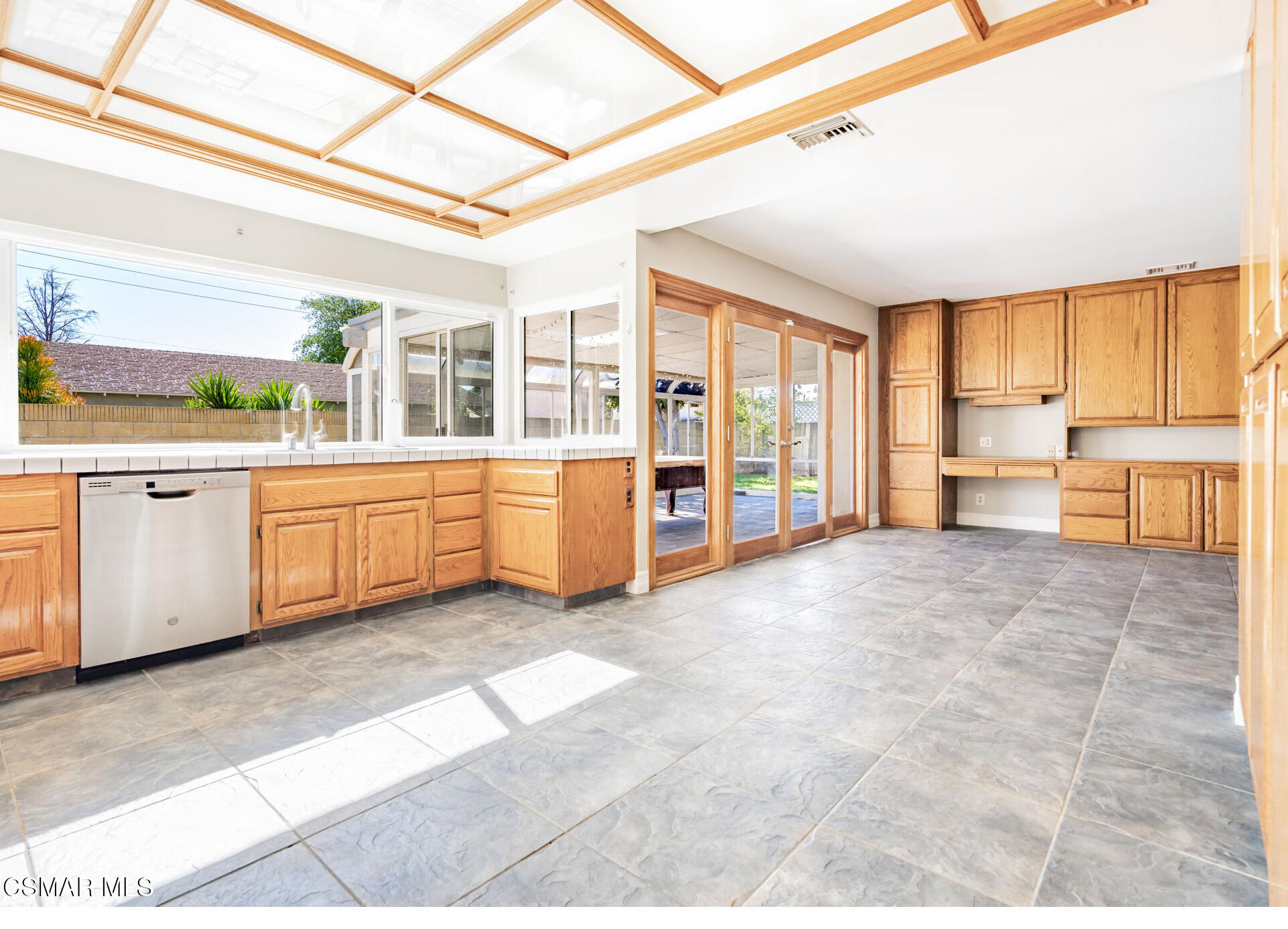 3648 Woodhaven Street Simi Valley, CA 93063 - Photo 10 of 30 a large white kitchen with a window