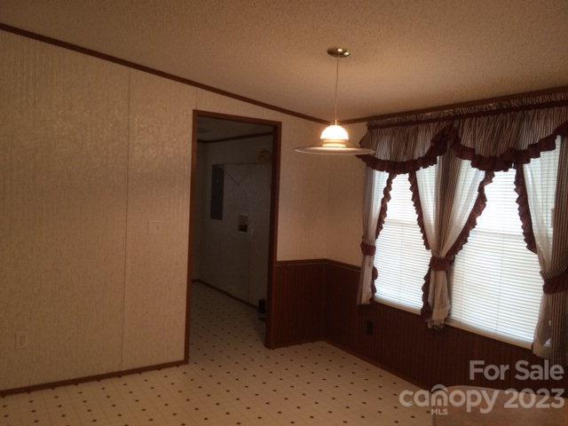 2099 Gheen Road Salisbury, NC 28147 - Photo 10 of 14 a view of a room with a large window and wooden floor