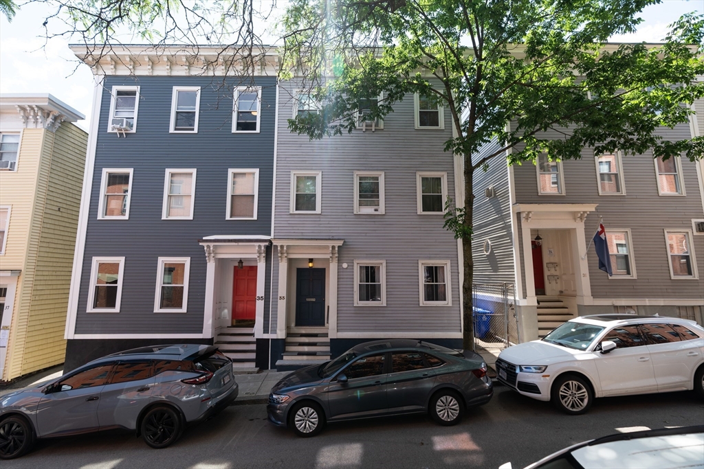 33 Mystic Street, Unit 3 Boston, MA 02129 - Photo 21 of 21 a car parked in front of a building