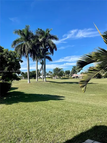 a view of an ocean with beach