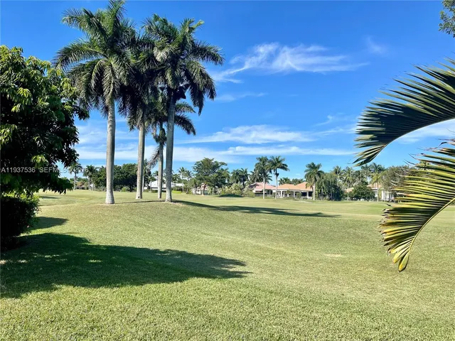 a view of an ocean & house