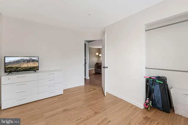 a view of a porch with furniture and front door