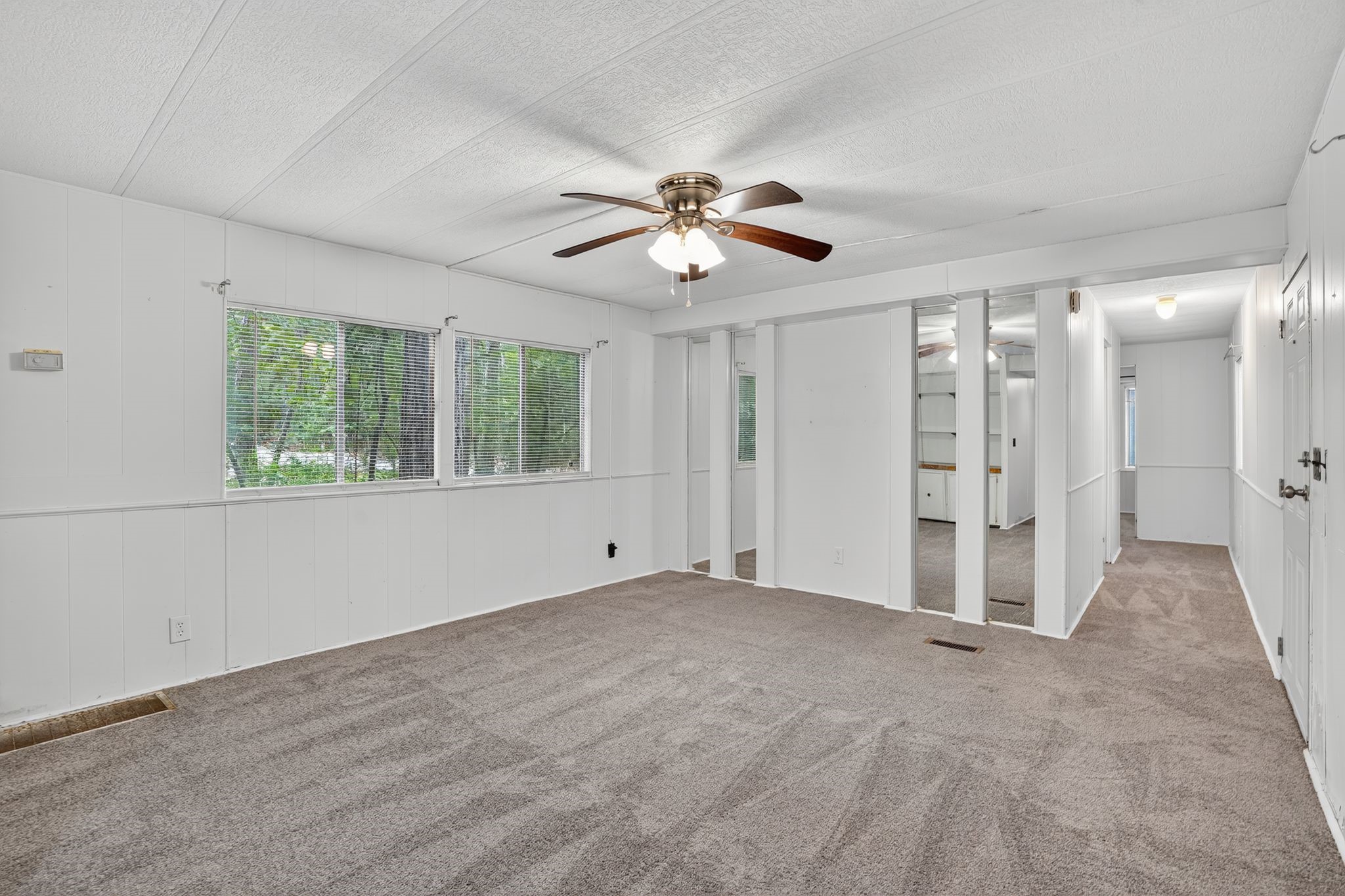 3 Meadowlark Trinity, TX 75862 - Photo 3 of 22 a view of an empty room with a window