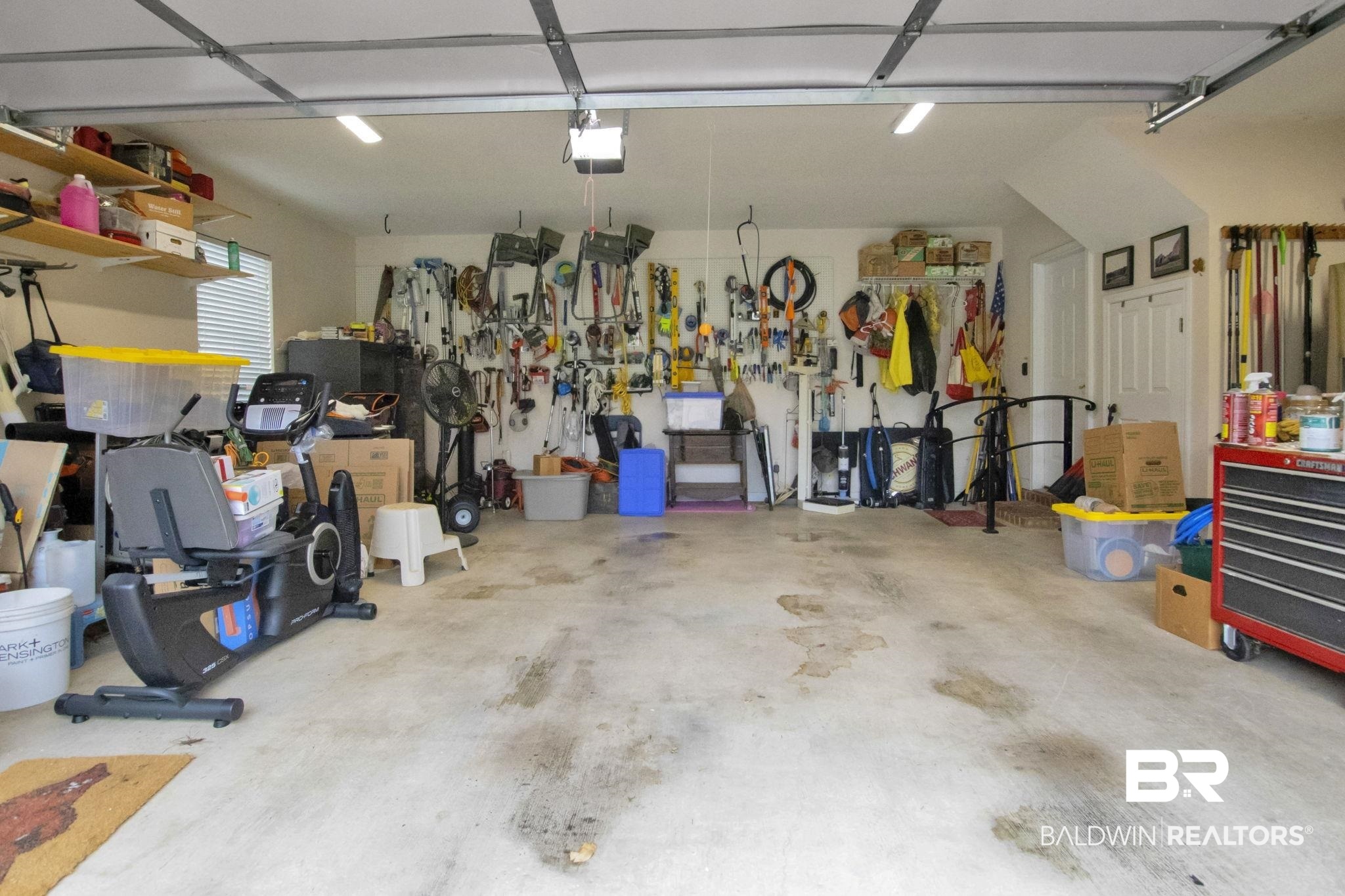1 Bens Bluff Daphne, AL 36527 - Photo 50 of 56 Garage featuring a garage door opener and a workshop area