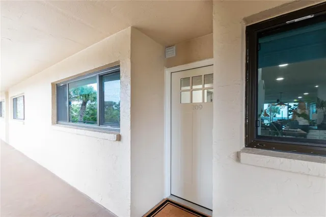 a view of a hallway with entryway