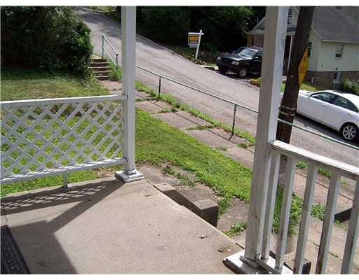1703 Rutherford Avenue Beechview, PA 15216 - Photo 7 of 9 Patio/Deck. covered front porch..room for a swing....sidwalk lined streets...easy walk to "t"
