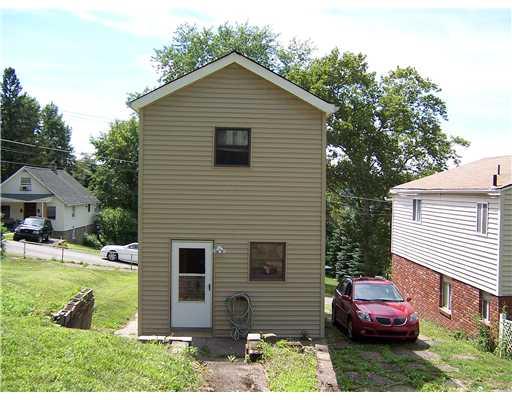 1703 Rutherford Avenue Beechview, PA 15216 - Photo 8 of 9 Yard/Garden. part of backyard and patio area.